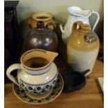 Quantity of stoneware flagons, pottery jug and bowl, one other jug etc Condition: