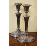 Pair of Georgian style silver plated candlesticks, each standing on an oval foot Condition: