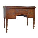 19th Century mahogany kneehole dressing table, fitted one drawer flanked by two cupboard doors on