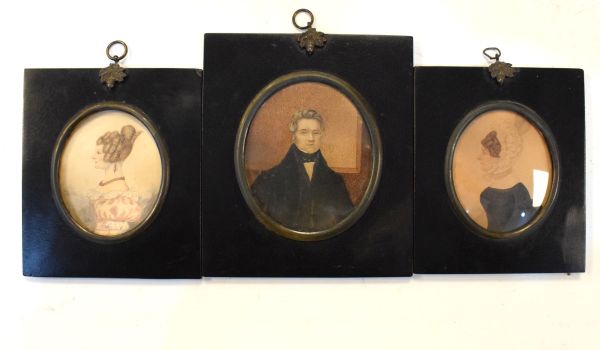 Three 19th Century watercolour portrait miniatures, each within ebonised frames Condition: