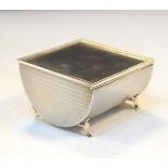 George V silver trough shaped desk top cigarette box having engine turned decoration and hinged