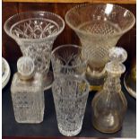 Quantity of cut glass vases, a cut glass decanter having silver collar and one other decanter