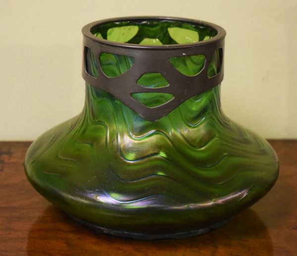 Late 19th Century Bohemian green iridescent glass squat shaped vase having moulded wrythened