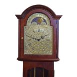 Reproduction longcase clock having brass finish arched dial with striking and chiming movement, in a