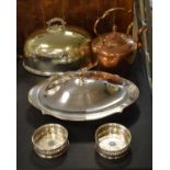 Copper kettle, silver plated meat dome, oval lidded warming dish and two silver plated wine coasters