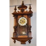 Late 19th/early 20th Century walnut and beech cased Vienna style wall clock, the off-white dial with