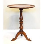 Victorian mahogany dish top wine table standing on a turned pillar and tripod base Condition: