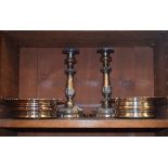 Pair of silver plated candlesticks, together with a pair of silver plated coasters Condition: