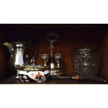 Silver plated egg cruet, hot water jug, silver plated mounted glass biscuit jar etc Condition: