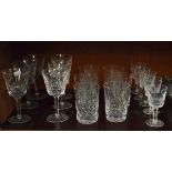 Set of six Waterford crystal Lismore pattern wine glasses, five similar port glasses and six cut