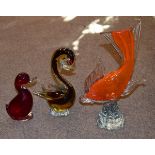 Glass figure of a fish together with two similar ducks Condition: