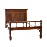 Antique oak bedstead, the head with three panels, central date and initials 1595 G.T.A., the foot