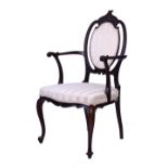 Edwardian carved mahogany framed cameo back open arm occasional chair upholstered in striped