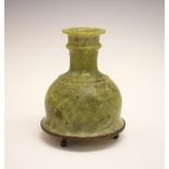 19th Century Indian green soapstone huqqa base standing on a brass base with three ball feet,