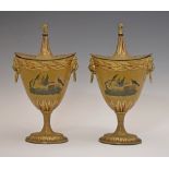 Pair of early 19th Century Tole Peinte chestnut urns, each decorated with birds in a landscape on an