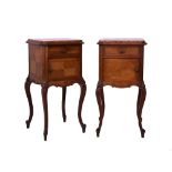 Pair of French oak bedside cupboards, each having a pink marble top, fitted one drawer, parquet