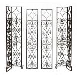 Four 19th Century wrought iron architectural canopy supports, two being corner pieces together