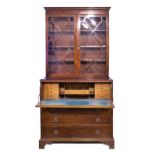 George III inlaid mahogany two section secretaire bookcase, the upper section fitted shelves