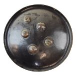 19th Century Indian shield dhal, of round form made of leather lacquered black set with five brass