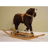 Mid 20th Century rocking horse/pull-along horse having detachable rockers, with leather tack