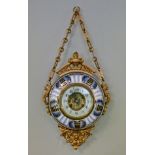 Late 19th Century French gilt cast base metal mounted porcelain wall clock, the circular case having
