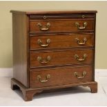 Reproduction mahogany chest fitted slide with four drawers below and standing on bracket feet