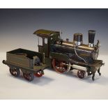 Gebruder Bing 0 gauge spirit burner steam locomotive and tender in green livery with red pinstripe