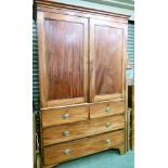 19th Century mahogany linen press, the upper section fitted two blind panel doors, the base fitted