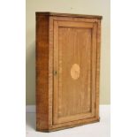 Georgian mahogany and string inlaid wall hanging corner cupboard, fitted blind panel door with