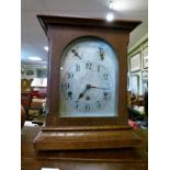 Early 20th Century oak cased bracket clock, the silvered dial with Arabic numerals and two