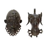 Two Benin bronze hip mask ornaments, the first formed as a goat, the second as a man, one hand