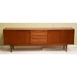 Late 1960's/early 1970's period teak Long John type sideboard fitted four sliding doors with three