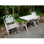 Reproduction Victorian style cast aluminium rectangular topped patio table and a pair of matching