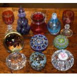 Collection of various glass paperweights and coloured glassware Condition: