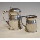 Liberty & Co English Pewter Arts & Crafts design pewter half pint mug together with a late Liberty &