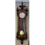 Late 19th/early 20th Century walnut and ebonised cased Vienna single weight wall clock, the white