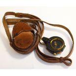 World War I compass by E. Koehn Of Geneva, No.58101, dated 1917 and with original stitched brown