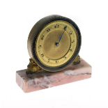 Small early 20th Century brass and enamel cased timepiece, the dial with Arabic numerals, pink