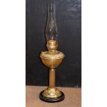 Late 19th/early 20th Century brass oil lamp having embossed decoration Condition: