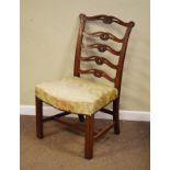 19th Century carved mahogany side chair having a carved and pierced ladder back, stuffed seat and