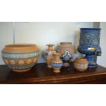 Collection of Doulton Lambeth Silicon Patent pieces comprising: jardinière, three vases and an ewer,