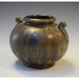 Art pottery squat globular vase, possibly French having a mottled brown glaze and two lug handles