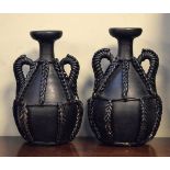 Pair of plaited leather bound black terracotta baluster shaped vases Condition: