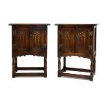 Pair of reproduction oak bedside/hall cupboards, each standing on turned supports united by