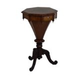 Victorian figured walnut octagonal top work table, the hinged cover opening to reveal a fitted