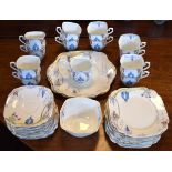 1930's period Standard China twelve person tea service decorated with a lady in a landscape