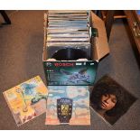Quantity of 33rpm records and various 12" singles, mainly 1970's and 80's Rock and Pop Condition: