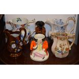 Welsh copper lustre jug, three other 19th Century pottery jugs, a treacle glazed Snufftaker Toby jug