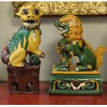 Chinese pottery figure of a Temple Lion together with a similar figure of a Fo Dog Condition: