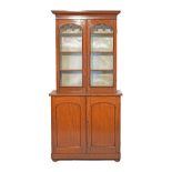 Victorian mahogany two section bookcase, the upper section fitted four shelved enclosed by a pair of